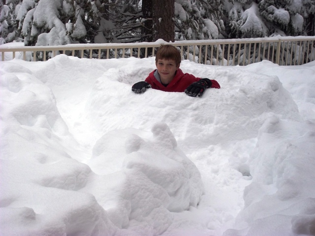 Nate pauses for a photo op while sculpting his fort!
