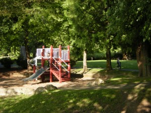 Shady and green playground in E.J. Roberts Park
